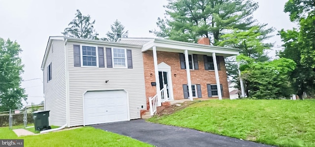 3 New Coach Ln, Willingboro, NJ 08046 - raised ranch with a front yard, a chimney, a garage, asphalt driveway, and brick siding