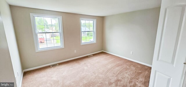 3 New Coach Ln, Willingboro, NJ 08046 - empty room with carpet flooring and baseboards