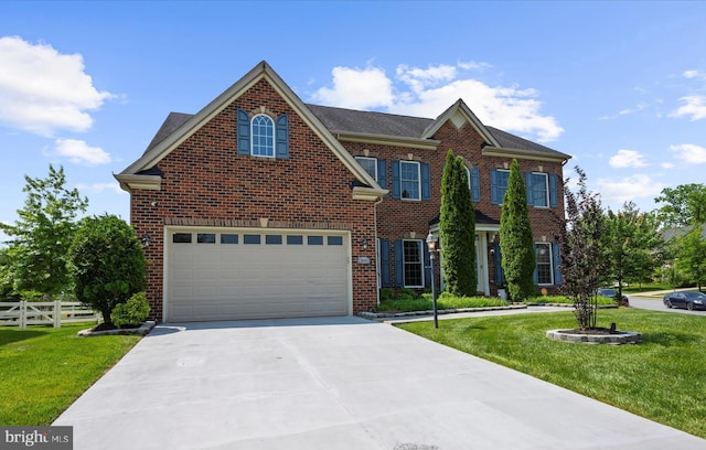 13801 Racetrack Field Ct, Bowie, MD 20720 - colonial-style house with driveway, brick siding, and an attached garage