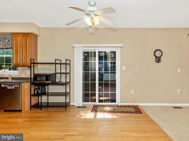 6418 Flintlock Ct, Eldersburg, MD 21784 - dining space featuring ceiling fan and light wood-style floors