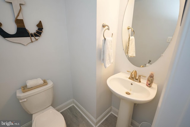 36063 Auburn Way, Millsboro, DE 19966 - half bathroom with toilet, baseboards, and wood finished floors