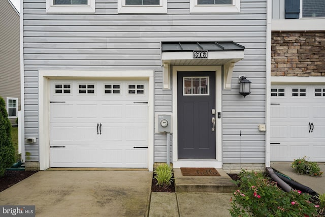 36063 Auburn Way, Millsboro, DE 19966 - view of exterior entry featuring a garage