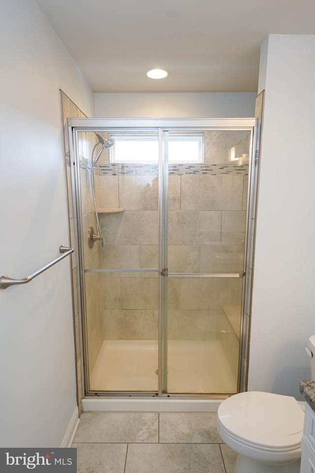36063 Auburn Way, Millsboro, DE 19966 - full bath with a stall shower, vanity, toilet, and tile patterned flooring