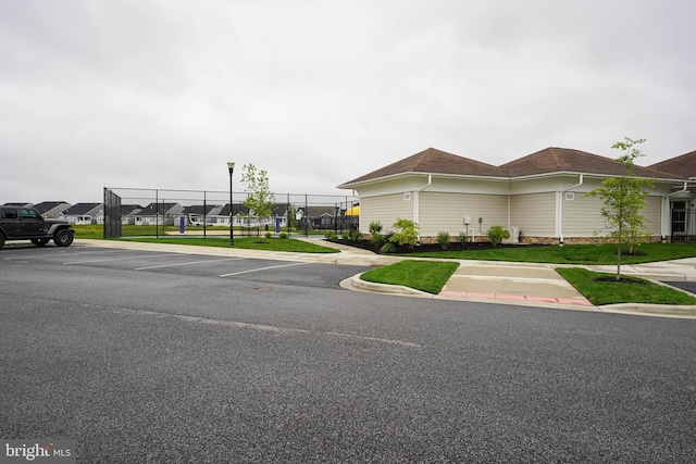 36063 Auburn Way, Millsboro, DE 19966 - view of asphalt road featuring curbs and street lights