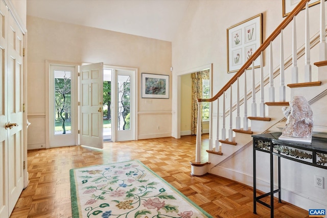 5190 Sugar Ridge Rd, Crozet, VA 22932 - foyer entrance featuring a towering ceiling, baseboards, healthy amount of natural light, and stairs