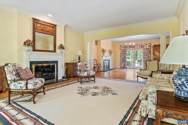 5190 Sugar Ridge Rd, Crozet, VA 22932 - living area with a premium fireplace, ornamental molding, decorative columns, and a chandelier