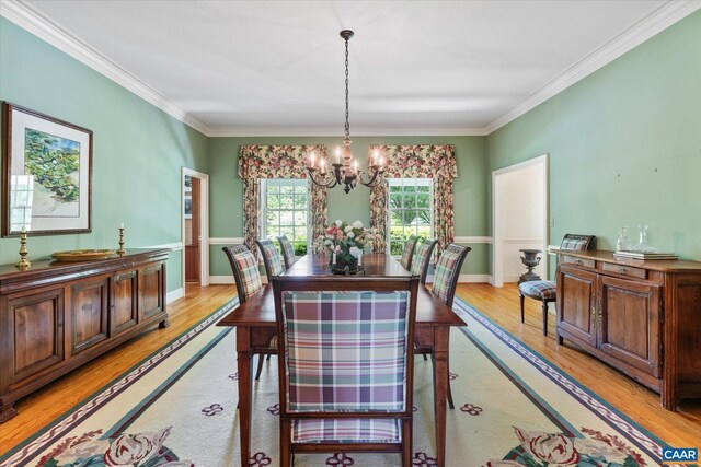 5190 Sugar Ridge Rd, Crozet, VA 22932 - dining space with a chandelier, light wood-style floors, crown molding, and baseboards