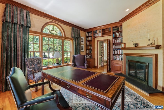5190 Sugar Ridge Rd, Crozet, VA 22932 - office space with ornamental molding, wood finished floors, built in features, a glass covered fireplace, and baseboards