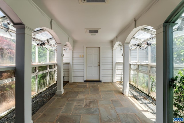 5190 Sugar Ridge Rd, Crozet, VA 22932 - unfurnished sunroom featuring arched walkways