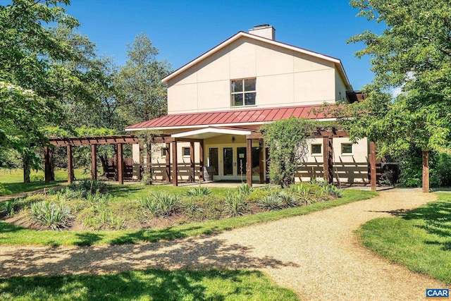 5190 Sugar Ridge Rd, Crozet, VA 22932 - back of house featuring french doors, a pergola, a patio area, a standing seam roof, and a chimney