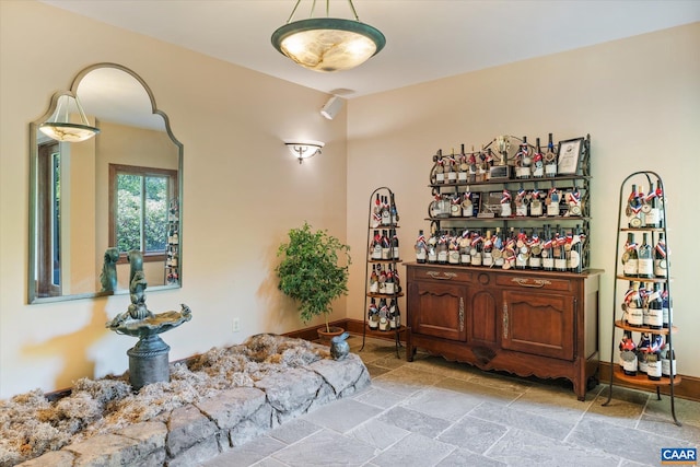 5190 Sugar Ridge Rd, Crozet, VA 22932 - bar area featuring stone tile flooring and baseboards