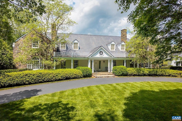 5190 Sugar Ridge Rd, Crozet, VA 22932 - cape cod-style house featuring covered porch, a front yard, a chimney, and a balcony