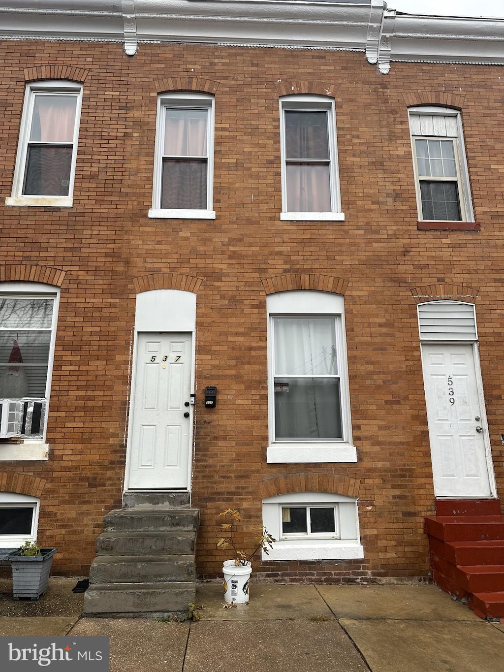 537 Fulton Ave, Baltimore, MD 21223 - view of front of house with entry steps and brick siding