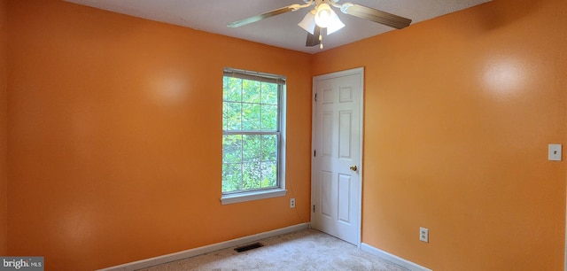 30120 Dudley Rd, Mechanicsville, MD 20659 - unfurnished room with baseboards, light carpet, and ceiling fan