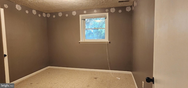 30120 Dudley Rd, Mechanicsville, MD 20659 - unfurnished room with a textured ceiling, carpet floors, and baseboards
