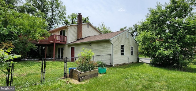 30120 Dudley Rd, Mechanicsville, MD 20659 - back of property featuring a chimney, a gate, and a deck