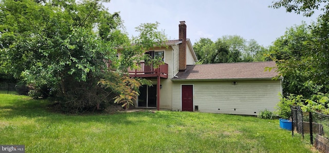 30120 Dudley Rd, Mechanicsville, MD 20659 - rear view of property with a wooden deck, a chimney, and roof with shingles