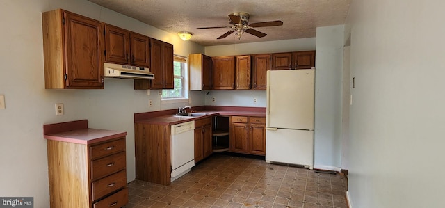 30120 Dudley Rd, Mechanicsville, MD 20659 - kitchen with white appliances, under cabinet range hood, a sink, ceiling fan, and a textured ceiling