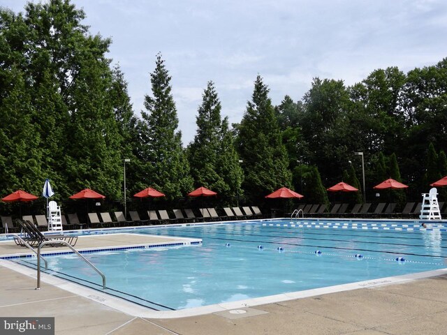 6536 Kelsey Point Cir, Alexandria, VA 22315 - community pool with a patio area