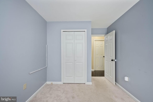 12329 Manchester Way, Woodbridge, VA 22192 - unfurnished bedroom featuring carpet, baseboards, and a closet