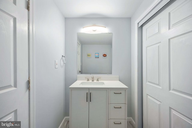 12329 Manchester Way, Woodbridge, VA 22192 - bathroom with vanity and baseboards