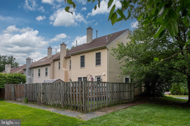12329 Manchester Way, Woodbridge, VA 22192 - back of house with a chimney