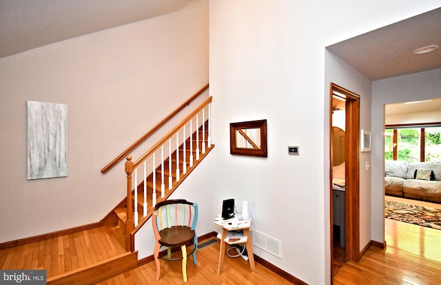 2415 Schaffer Rd, Pottstown, PA 19464 - stairs with hardwood / wood-style flooring and baseboards