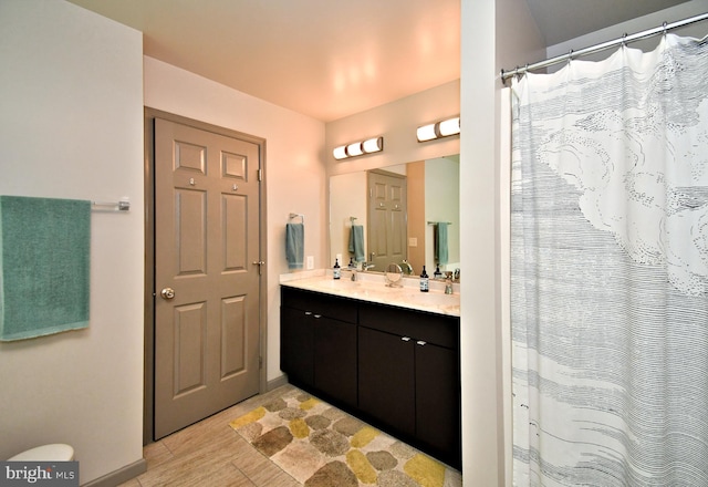 2415 Schaffer Rd, Pottstown, PA 19464 - full bathroom with vanity, baseboards, and curtained shower