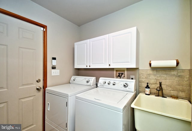 2415 Schaffer Rd, Pottstown, PA 19464 - laundry area with washing machine and clothes dryer and cabinet space