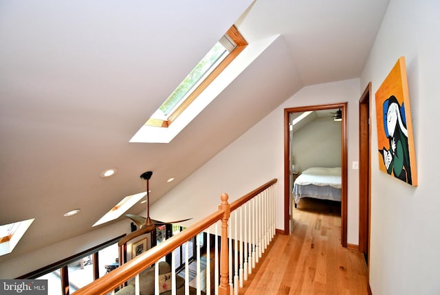 2415 Schaffer Rd, Pottstown, PA 19464 - hallway featuring a skylight, light wood-style flooring, lofted ceiling, and recessed lighting