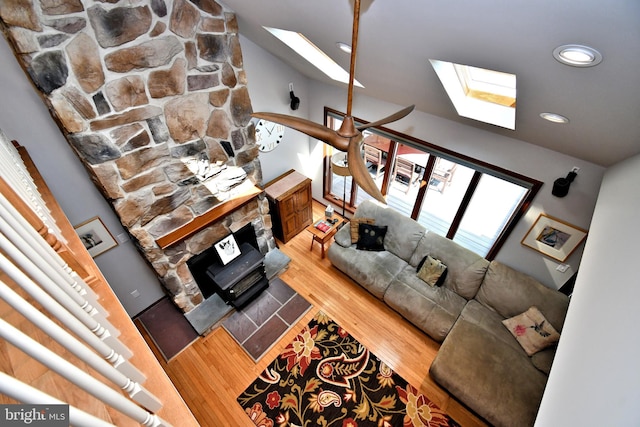 2415 Schaffer Rd, Pottstown, PA 19464 - living room featuring a skylight, wood finished floors, a fireplace, and recessed lighting