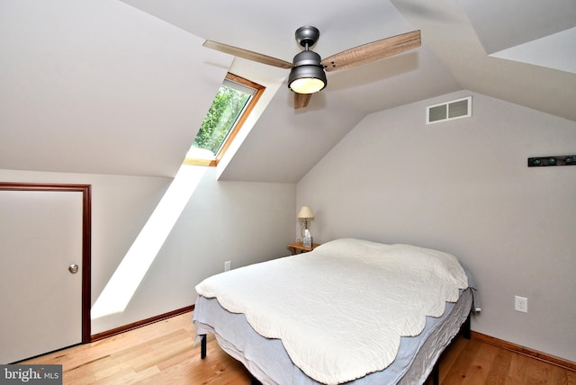 2415 Schaffer Rd, Pottstown, PA 19464 - bedroom with vaulted ceiling, wood finished floors, a ceiling fan, and baseboards