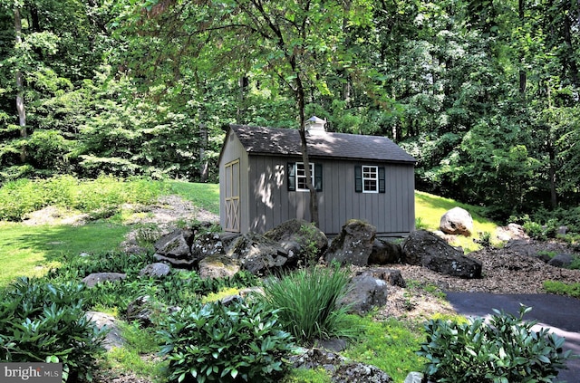 2415 Schaffer Rd, Pottstown, PA 19464 - view of shed featuring a forest view