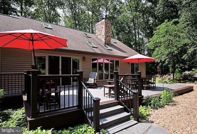 2415 Schaffer Rd, Pottstown, PA 19464 - deck featuring outdoor dining area and view of scattered trees