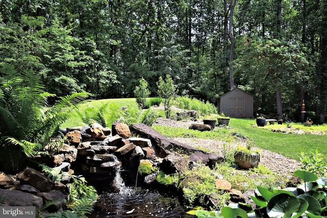 2415 Schaffer Rd, Pottstown, PA 19464 - view of green lawn with a small pond