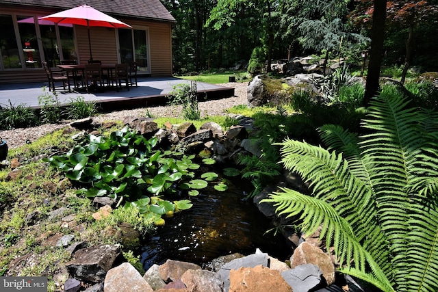 2415 Schaffer Rd, Pottstown, PA 19464 - view of yard featuring a garden pond and a deck