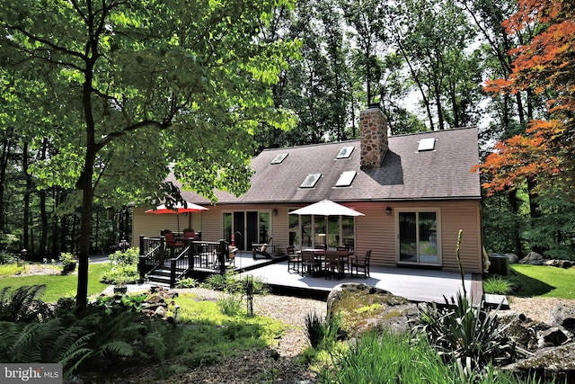 2415 Schaffer Rd, Pottstown, PA 19464 - rear view of property with a deck, roof with shingles, a chimney, and a yard