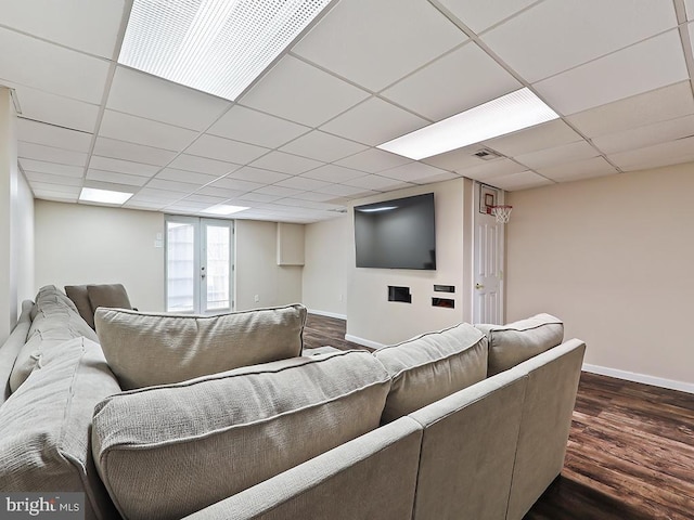 3721 S Hereford Ln, Philadelphia, PA 19114 - living area with baseboards, dark wood-style floors, and a paneled ceiling