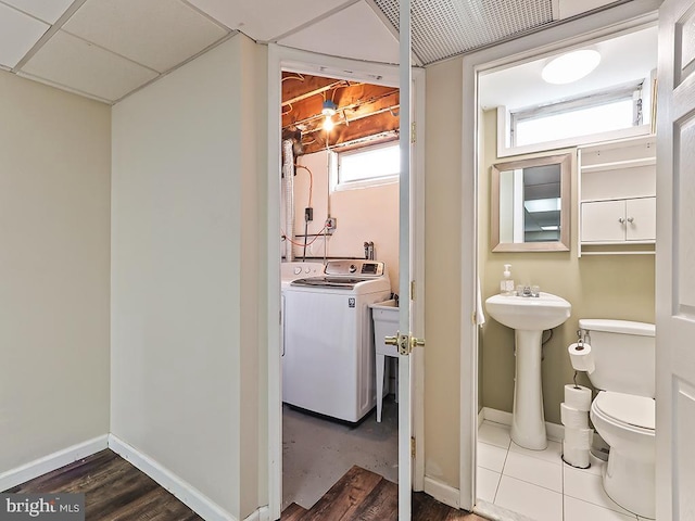 3721 S Hereford Ln, Philadelphia, PA 19114 - bathroom featuring washer / dryer, toilet, baseboards, and a sink