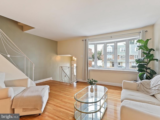 3721 S Hereford Ln, Philadelphia, PA 19114 - living room featuring wood finished floors, plenty of natural light, and baseboards
