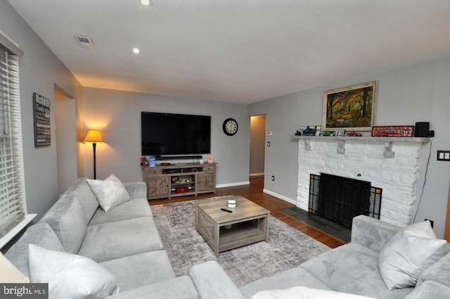 628 Mercer St, Cherry Hill, NJ 08002 - living area featuring wood finished floors, a fireplace, baseboards, and recessed lighting