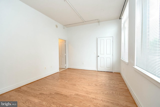 4490 Market Commons Dr Unit 302, Fairfax, VA 22033 - unfurnished room featuring light wood-type flooring and baseboards
