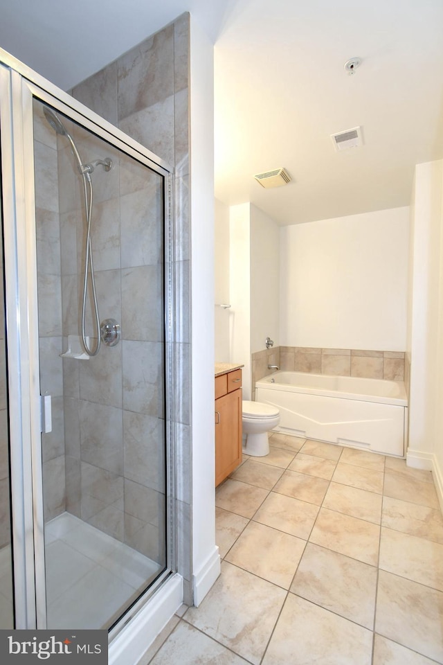 4490 Market Commons Dr Unit 302, Fairfax, VA 22033 - full bathroom featuring a stall shower, tile patterned floors, a bath, vanity, and toilet