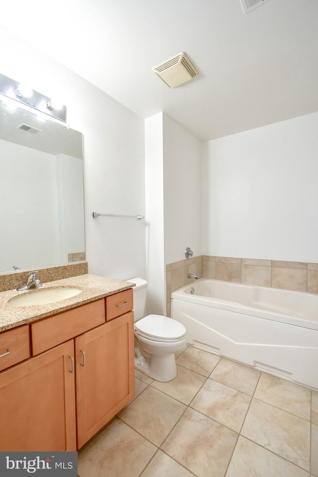 4490 Market Commons Dr Unit 302, Fairfax, VA 22033 - full bathroom featuring a garden tub, vanity, toilet, and tile patterned floors