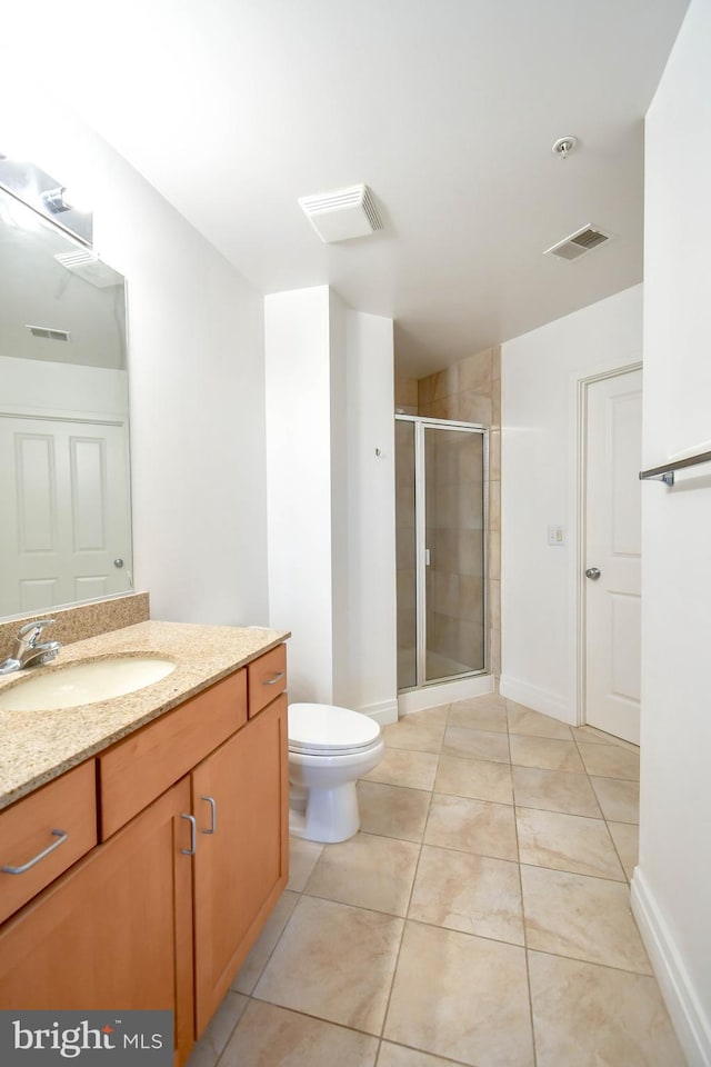 4490 Market Commons Dr Unit 302, Fairfax, VA 22033 - full bath with vanity, a shower stall, toilet, and tile patterned flooring