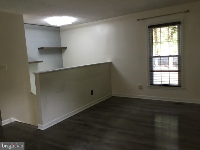 24 Galt Way, Stafford, VA 22554 - unfurnished room featuring dark wood-style flooring, baseboards, and a textured ceiling