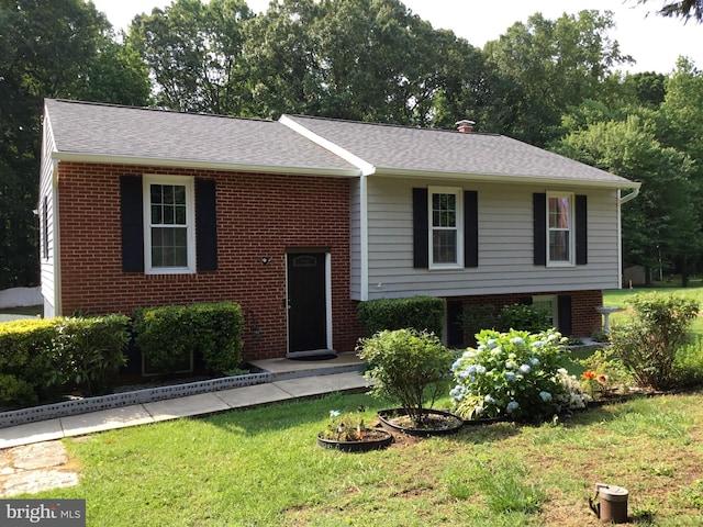 24 Galt Way, Stafford, VA 22554 - raised ranch with brick siding, a front yard, and a shingled roof