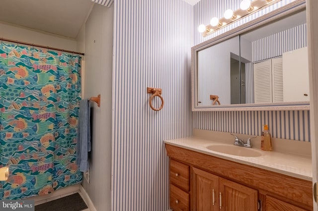 419 S Wyomissing Ave, Reading, PA 19607 - bathroom with vanity and a shower with shower curtain