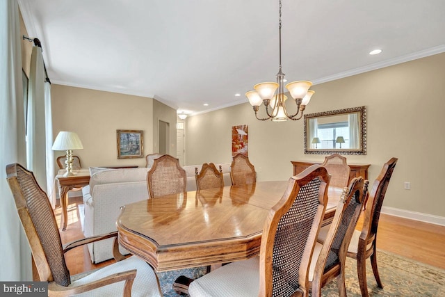 332 Blanketflower Ln, West Windsor, NJ 08550 - dining space featuring a chandelier, crown molding, recessed lighting, wood finished floors, and baseboards
