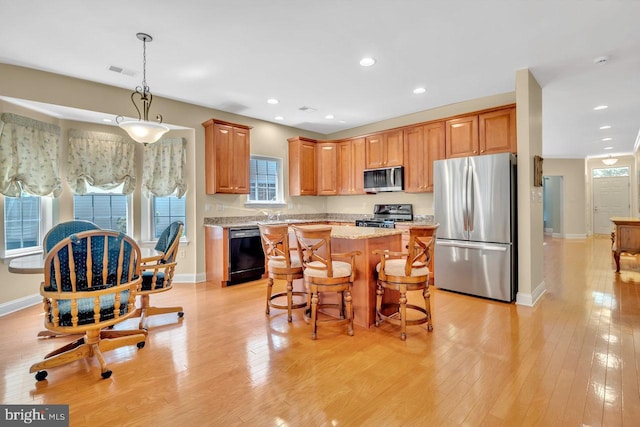 332 Blanketflower Ln, West Windsor, NJ 08550 - kitchen featuring appliances with stainless steel finishes, a center island, baseboards, plenty of natural light, and recessed lighting